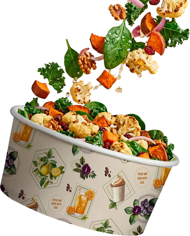 Taça de salada fresca com ingredientes a cair lá para dentro